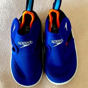 Little boys size small (5-6) speedo water shoes.Brand new without tags